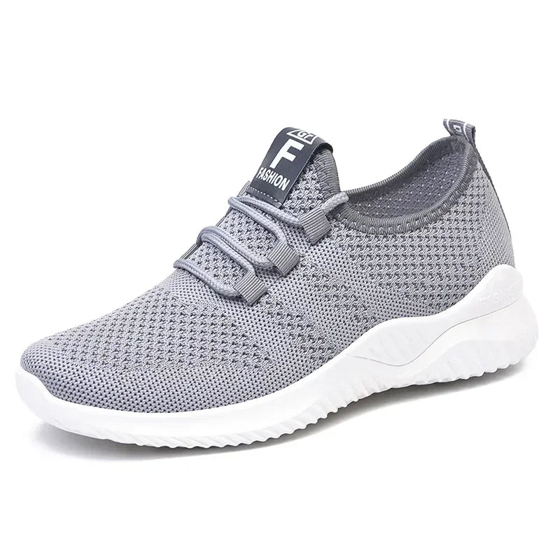 Chaussures de sport décontractées pour femmes en couleurs unies avec empeigne en tricot et semelles souples pour la course à pied, le tennis et les entraînements, idéales pour les voyages