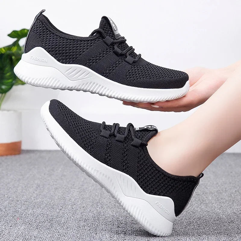 Chaussures de sport décontractées pour femmes en couleurs unies avec empeigne en tricot et semelles souples pour la course à pied, le tennis et les entraînements, idéales pour les voyages